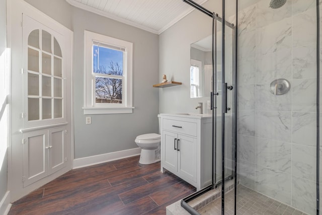 150 N Raynor Ave, Joliet, IL 60435 - bathroom featuring ornamental molding, a shower stall, vanity, and wood finished floors