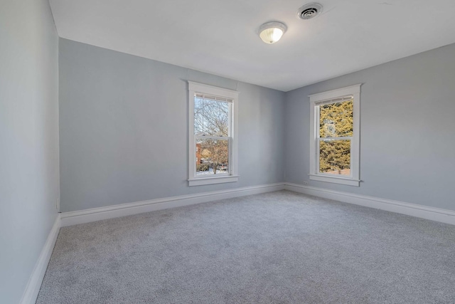 150 N Raynor Ave, Joliet, IL 60435 - carpeted spare room featuring baseboards
