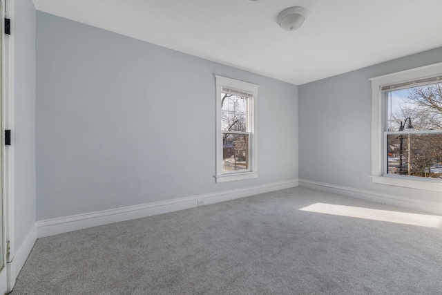 150 N Raynor Ave, Joliet, IL 60435 - empty room featuring carpet floors and healthy amount of natural light
