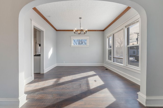 150 N Raynor Ave, Joliet, IL 60435 - unfurnished dining area featuring dark wood-type flooring, ornamental molding, arched walkways, a textured ceiling, and a chandelier
