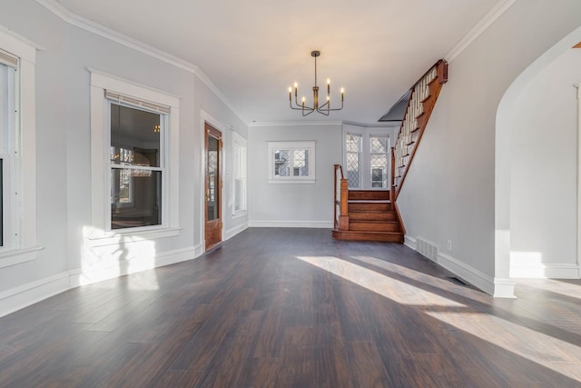 150 N Raynor Ave, Joliet, IL 60435 - unfurnished living room featuring a chandelier, wood finished floors, stairs, and ornamental molding
