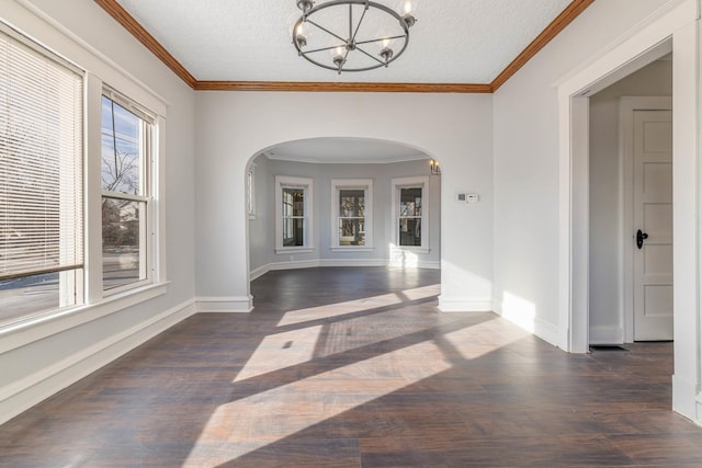 150 N Raynor Ave, Joliet, IL 60435 - unfurnished dining area with arched walkways, a chandelier, wood finished floors, a textured ceiling, and ornamental molding