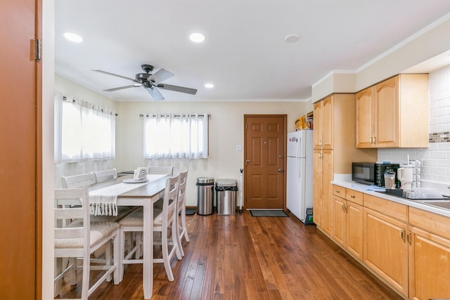 15246 S Millard Ave S, Midlothian, IL 60445 - kitchen featuring freestanding refrigerator, black microwave, ceiling fan, dark wood finished floors, and tasteful backsplash