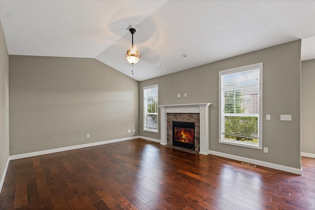201 Cattail Ave, Savoy, IL 61874 - unfurnished living room featuring plenty of natural light, a fireplace, ceiling fan, wood finished floors, and lofted ceiling