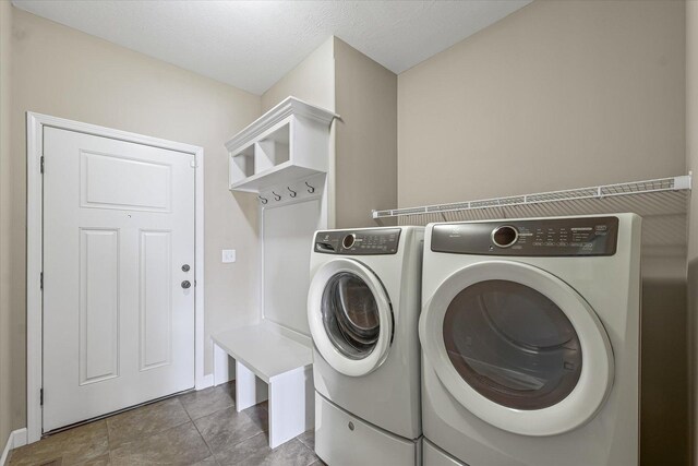 201 Cattail Ave, Savoy, IL 61874 - laundry room featuring separate washer and dryer and baseboards