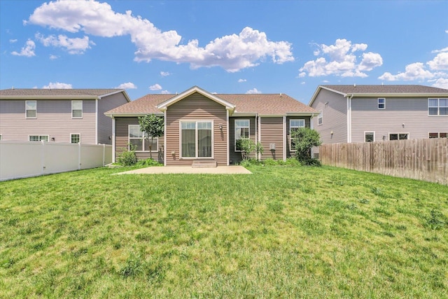 201 Cattail Ave, Savoy, IL 61874 - rear view of house with a fenced backyard, a patio, and entry steps