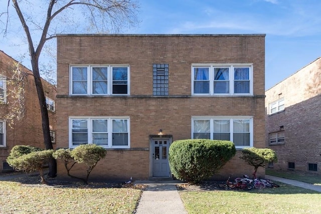 8914 La Crosse Ave Unit 2S, Skokie, IL 60077 - view of front of property featuring brick siding and a front lawn