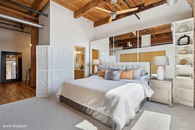 2511 W Moffat St Unit 305-D, Chicago, IL 60647 - bedroom with a wood ceiling with exposed beams, carpet floors, and ensuite bath