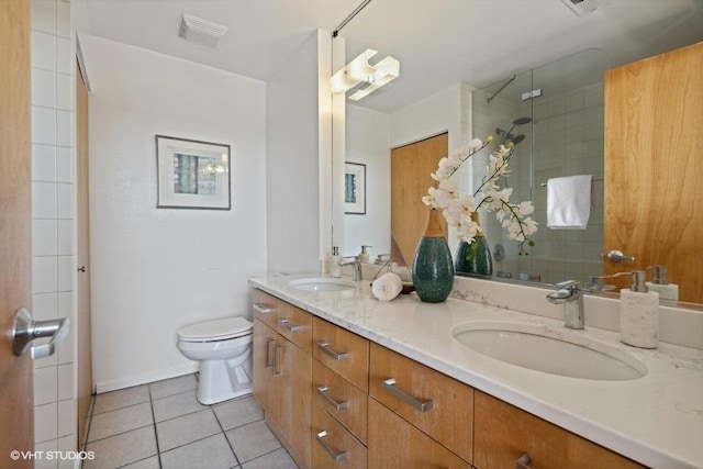 2511 W Moffat St Unit 305-D, Chicago, IL 60647 - bathroom with tile patterned flooring, double vanity, and a stall shower