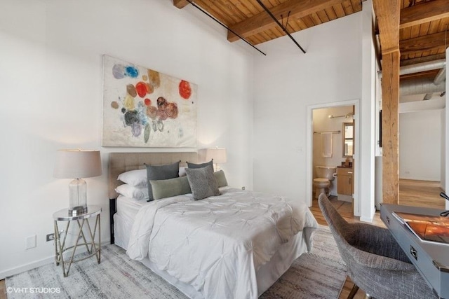 2511 W Moffat St Unit 305-D, Chicago, IL 60647 - bedroom with a wooden ceiling with exposed beams, wood finished floors, and ensuite bath
