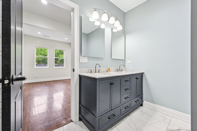 6547 S Langley Ave, Chicago, IL 60637 - full bath featuring double vanity, marble finish flooring, and recessed lighting