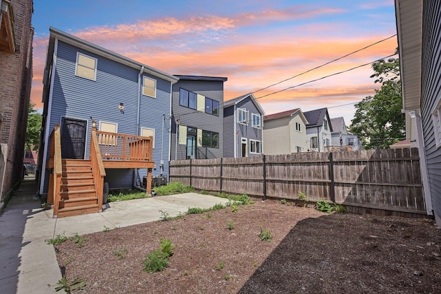 6547 S Langley Ave, Chicago, IL 60637 - back of house with a residential view, a patio, and a wooden deck
