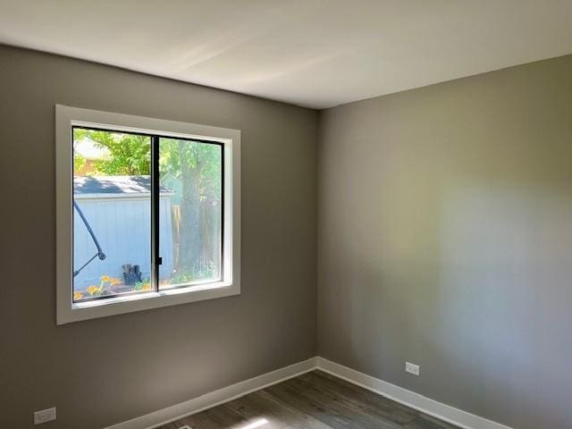 3105 Fox Hill Rd, Aurora, IL 60504 - spare room featuring baseboards and dark wood finished floors