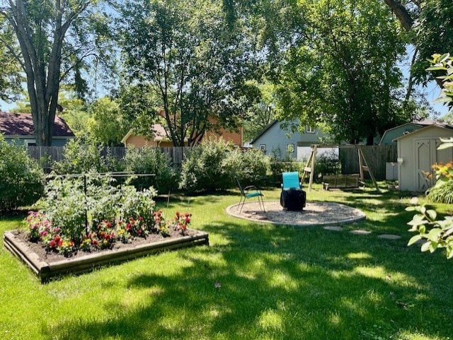 3105 Fox Hill Rd, Aurora, IL 60504 - view of yard with a shed and a vegetable garden