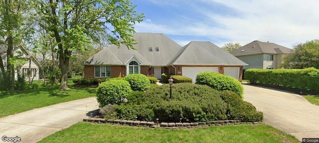 20195 Augusta Dr, Olympia Fields, IL 60461 - view of front of home with driveway, a garage, a front yard, and brick siding