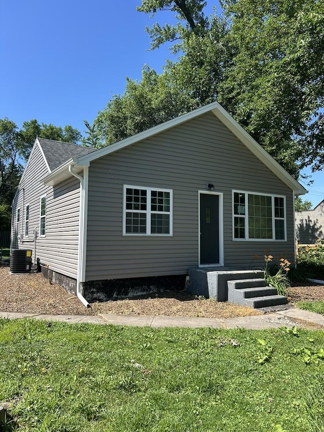 5309 Cleveland Dr, Mchenry, IL 60050 - bungalow-style home with a front yard and roof with shingles