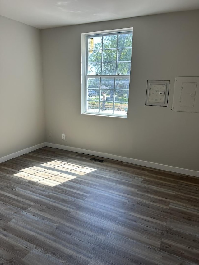 5309 Cleveland Dr, Mchenry, IL 60050 - unfurnished room with baseboards and dark wood finished floors