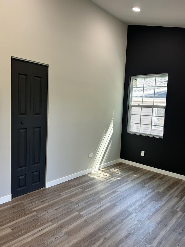 5309 Cleveland Dr, Mchenry, IL 60050 - unfurnished room featuring wood finished floors and recessed lighting