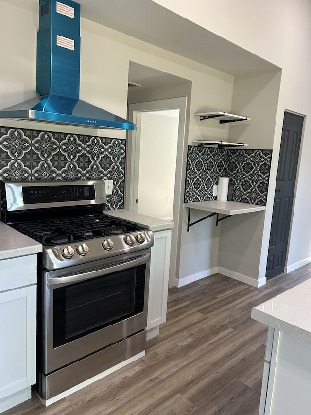 5309 Cleveland Dr, Mchenry, IL 60050 - kitchen featuring gas range, wall chimney range hood, open shelves, wood finished floors, and white cabinets