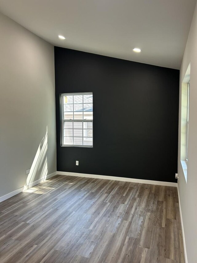 5309 Cleveland Dr, Mchenry, IL 60050 - spare room featuring wood finished floors and recessed lighting