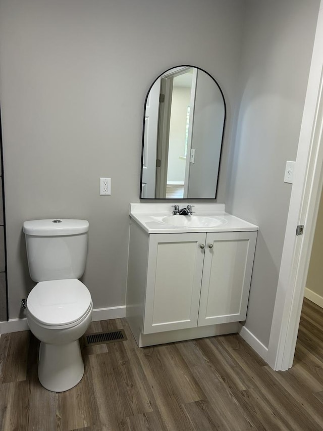 5309 Cleveland Dr, Mchenry, IL 60050 - half bath featuring wood finished floors and vanity
