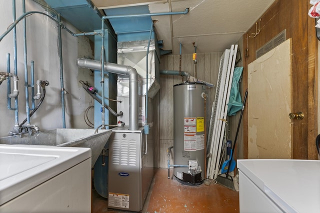 381 N 4th Ave Unit B, Des Plaines, IL 60016 - utility room featuring gas water heater and washer / dryer