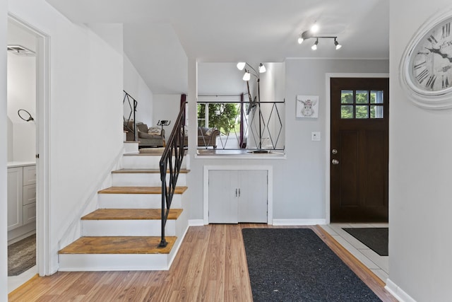 381 N 4th Ave Unit B, Des Plaines, IL 60016 - entryway featuring stairway, wood finished floors, and healthy amount of natural light