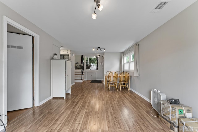 381 N 4th Ave Unit B, Des Plaines, IL 60016 - dining room featuring wood finished floors and track lighting