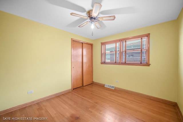 11258 S Trumbull Ave S, Chicago, IL 60655 - unfurnished bedroom featuring a closet, light wood-style floors, and ceiling fan