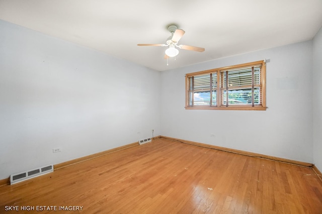 11258 S Trumbull Ave S, Chicago, IL 60655 - unfurnished room featuring a ceiling fan and light wood-style floors