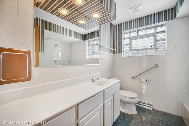 11258 S Trumbull Ave S, Chicago, IL 60655 - bathroom featuring tile walls, baseboard heating, a shower, vanity, and a tub to relax in