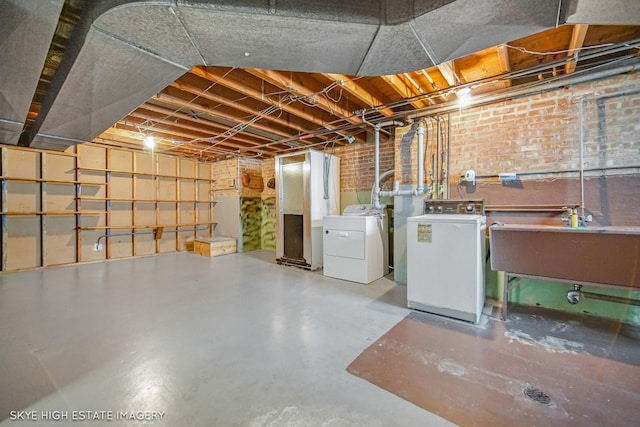11258 S Trumbull Ave S, Chicago, IL 60655 - unfinished below grade area with independent washer and dryer and brick wall