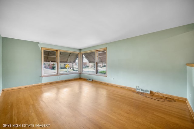 11258 S Trumbull Ave S, Chicago, IL 60655 - unfurnished room with wood finished floors and baseboards