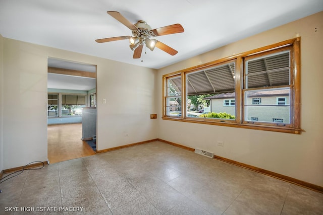 11258 S Trumbull Ave S, Chicago, IL 60655 - unfurnished room with baseboards and a ceiling fan