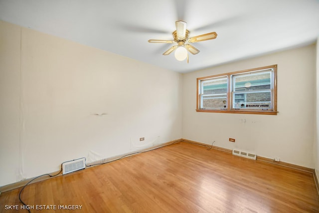 11258 S Trumbull Ave S, Chicago, IL 60655 - unfurnished room featuring ceiling fan and light wood-type flooring