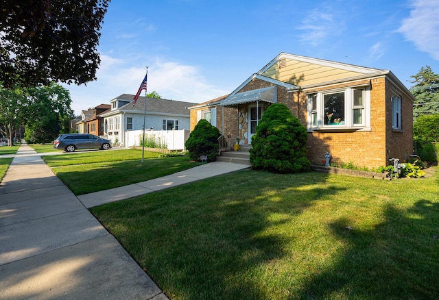 2551 Elm St, River Grove, IL 60171 - bungalow with brick siding and a front lawn