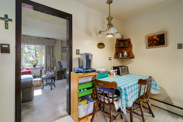 2551 Elm St, River Grove, IL 60171 - carpeted dining area featuring a baseboard heating unit