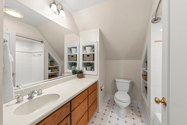 260 N Charlotte St, Lombard, IL 60148 - bathroom featuring vanity, vaulted ceiling, and tile patterned floors
