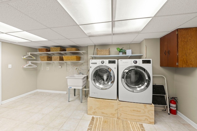 260 N Charlotte St, Lombard, IL 60148 - laundry area with light tile patterned flooring and separate washer and dryer