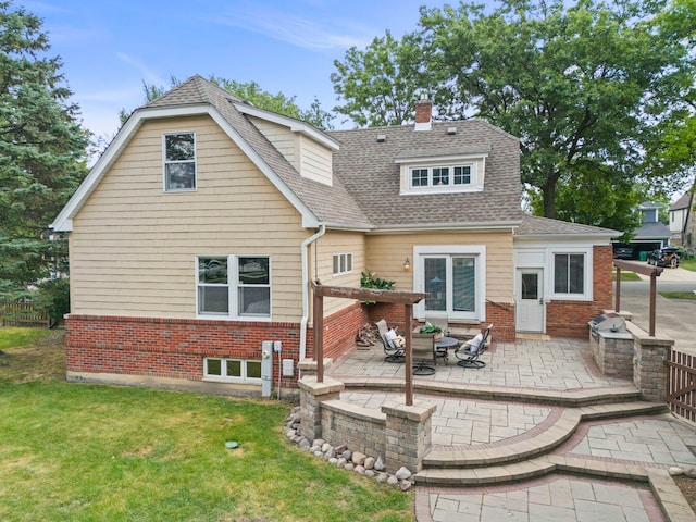 260 N Charlotte St, Lombard, IL 60148 - rear view of property featuring a shingled roof, a patio area, a chimney, a yard, and brick siding