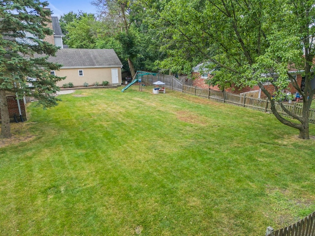 260 N Charlotte St, Lombard, IL 60148 - fenced backyard featuring a playground