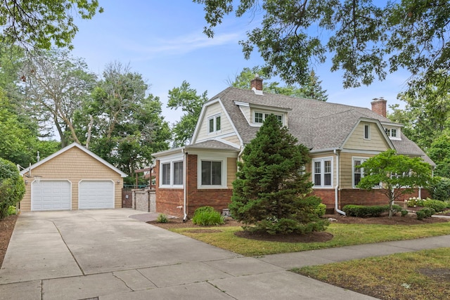 260 N Charlotte St, Lombard, IL 60148 - view of front of house with a chimney, an outbuilding, and brick siding