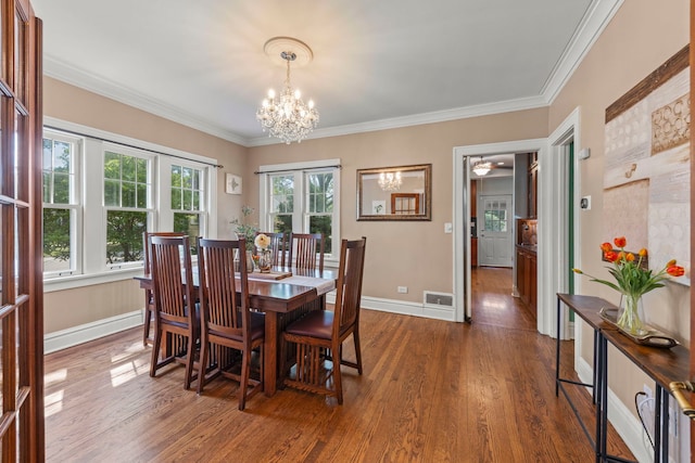 260 N Charlotte St, Lombard, IL 60148 - dining area featuring a chandelier, dark wood finished floors, and crown molding