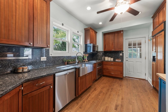 260 N Charlotte St, Lombard, IL 60148 - kitchen featuring appliances with stainless steel finishes, plenty of natural light, light wood-style floors, tasteful backsplash, and recessed lighting