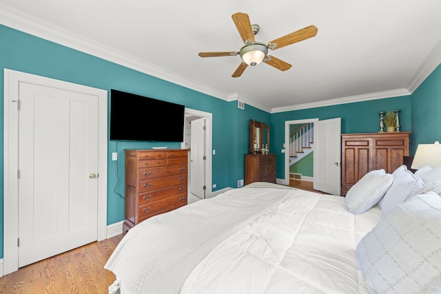 260 N Charlotte St, Lombard, IL 60148 - bedroom with crown molding, wood finished floors, and ceiling fan