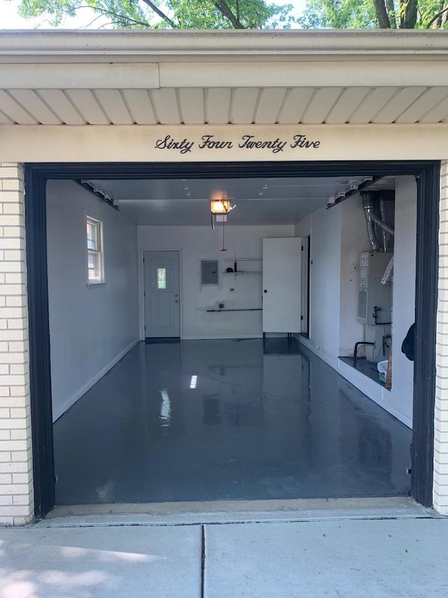 6425 W 83rd Pl, Burbank, IL 60459 - garage featuring electric panel and a garage door opener