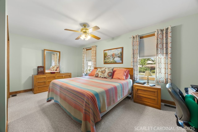 412 S Addison Ave, Lombard, IL 60148 - bedroom featuring multiple windows, light carpet, a ceiling fan, and an office area