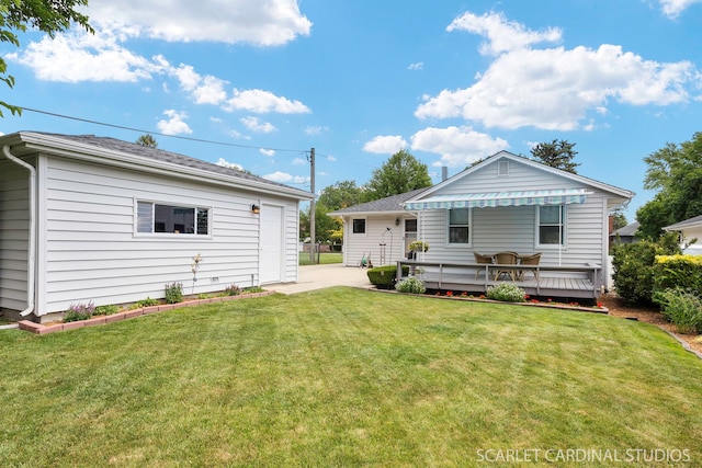 412 S Addison Ave, Lombard, IL 60148 - rear view of house with a deck and a lawn