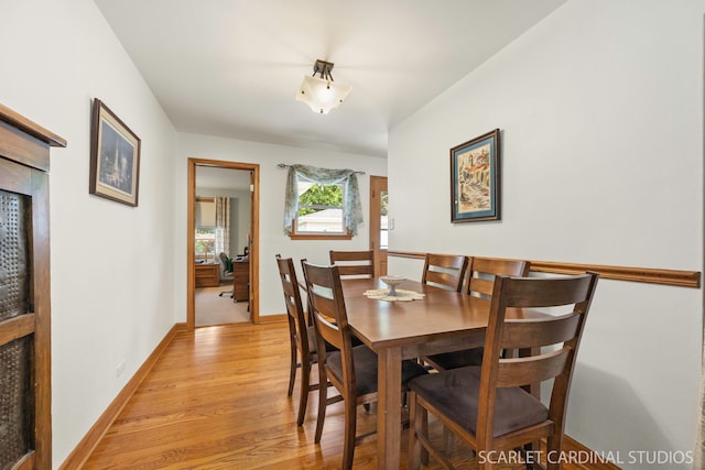 412 S Addison Ave, Lombard, IL 60148 - dining area featuring light wood-style flooring and baseboards