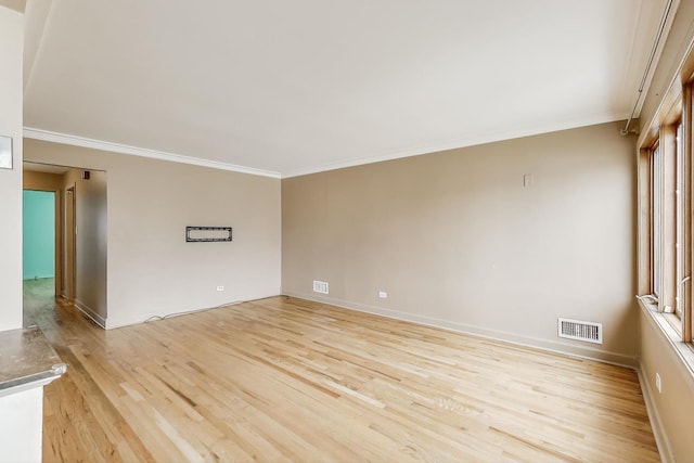 6105 W 83rd St, Burbank, IL 60459 - unfurnished room featuring light wood-style flooring and crown molding